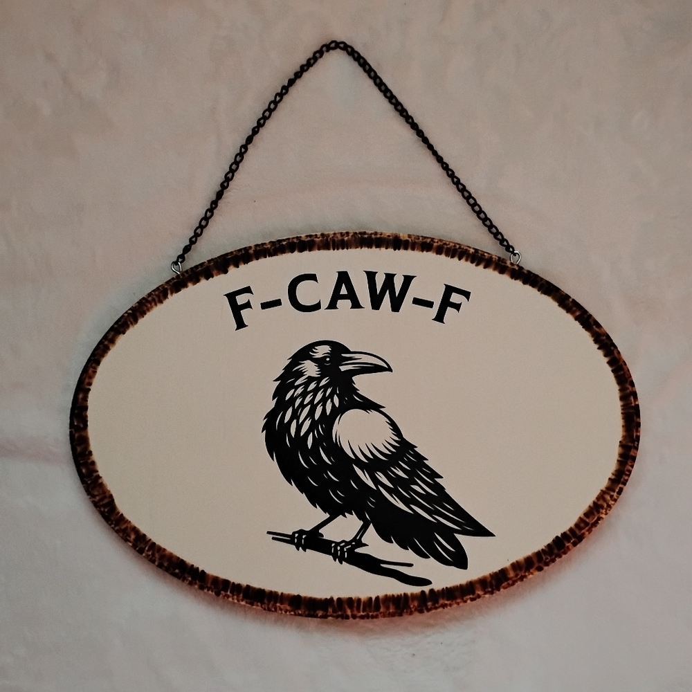 Oval Wall Sign with Bird Design